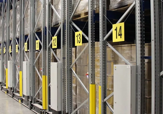 Assembly of mobile pallet racking systems SSI Schäfer